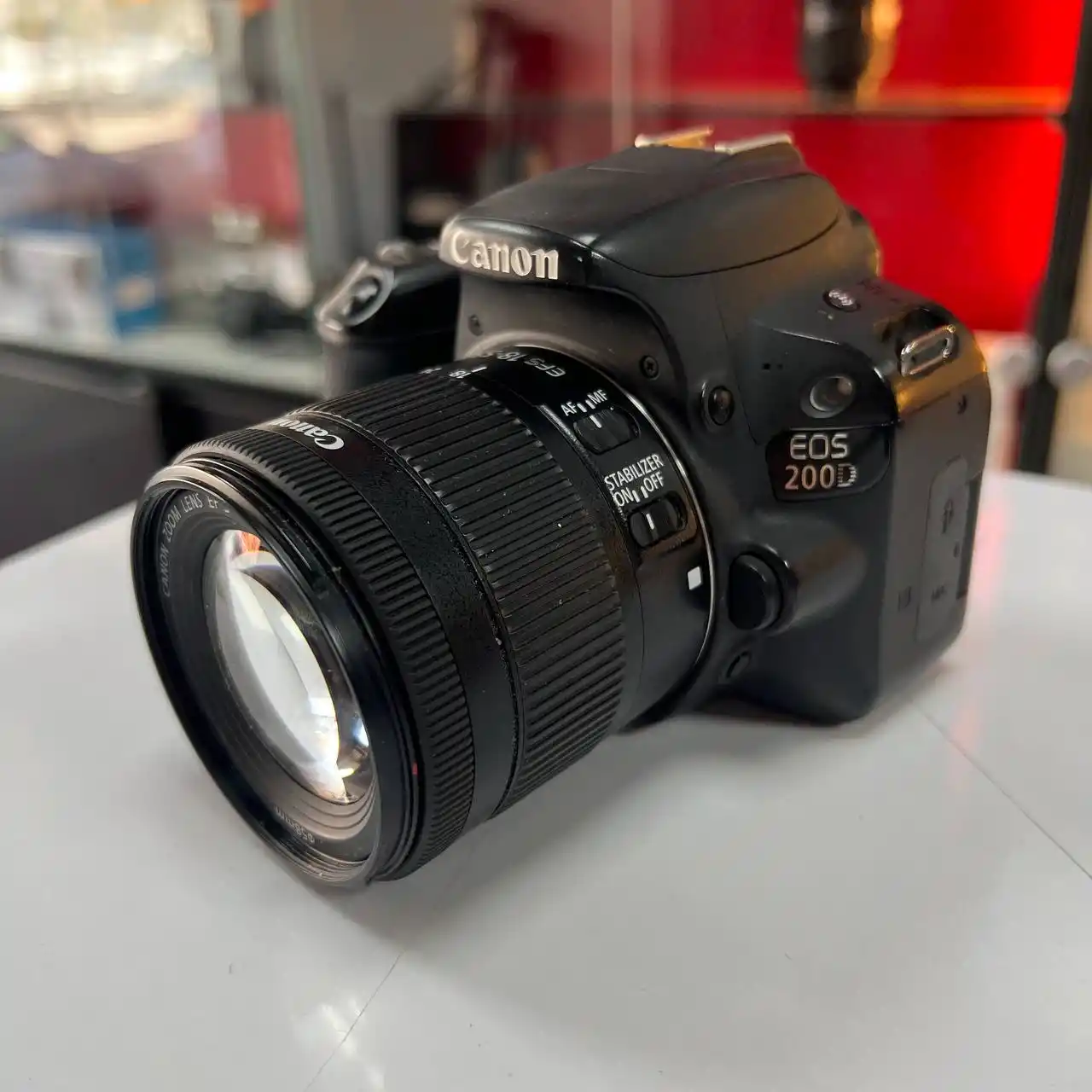 دوربین نیمه حرفه‌ای کانن کارکرده  | Canon 200D+18-55mm   (شات 7k) دست دو