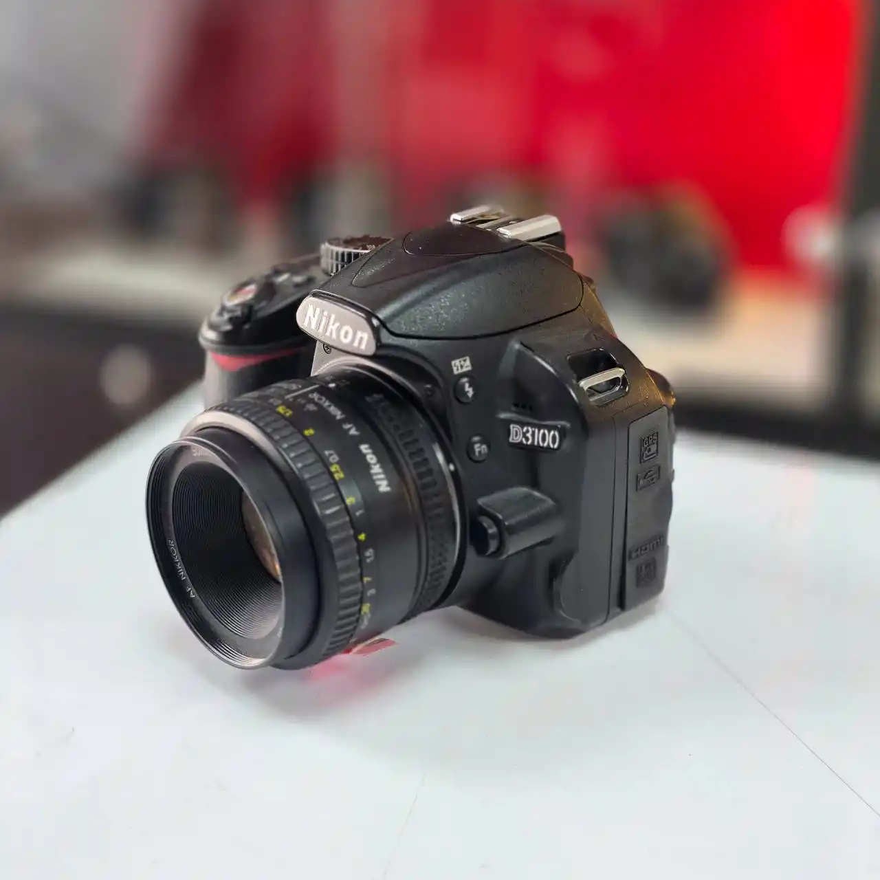 دوربین نیمه حرفه ای نیکون | Nikon D3100+50mm F1.8 D دست دو