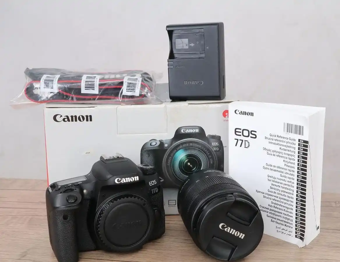 دوربین کانن 77d لنز 135*18 دست دو