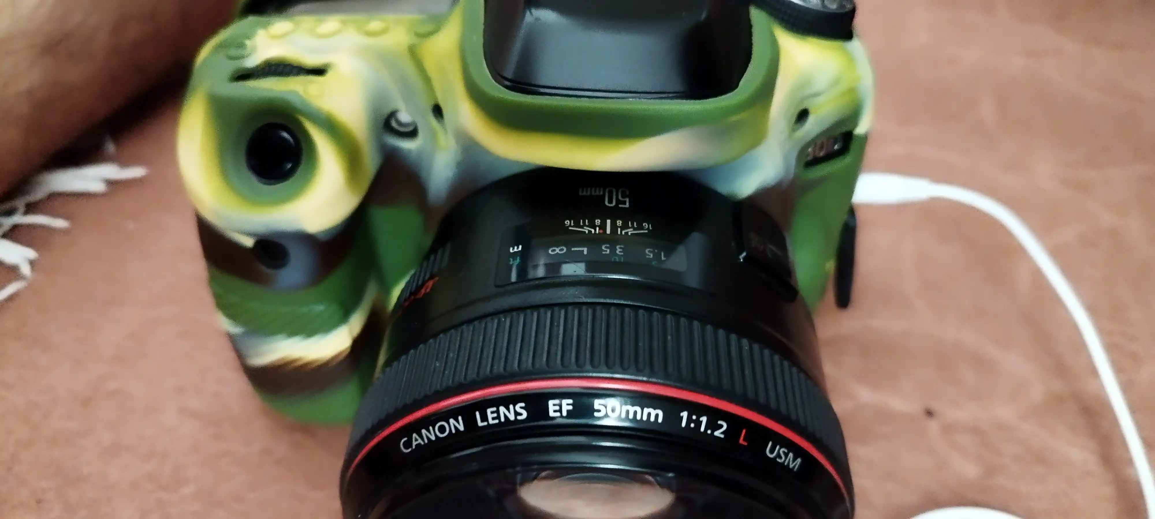 لنز f1.2 کنون usm دست دو