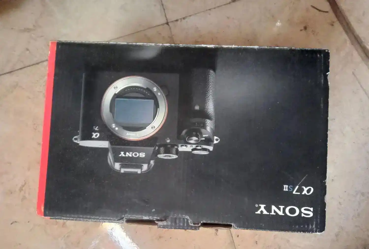 کارتون دوربین سونی a7s دست دو