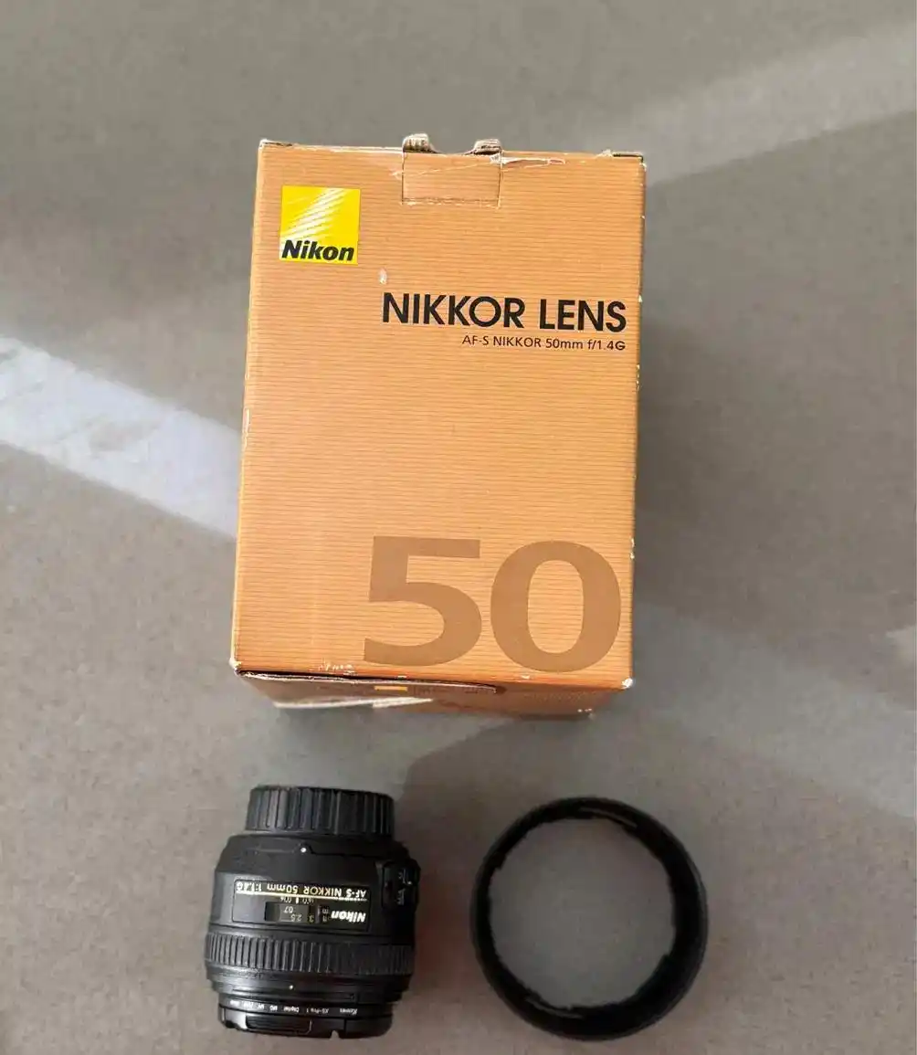 لنز نیکون 50mm دست دو