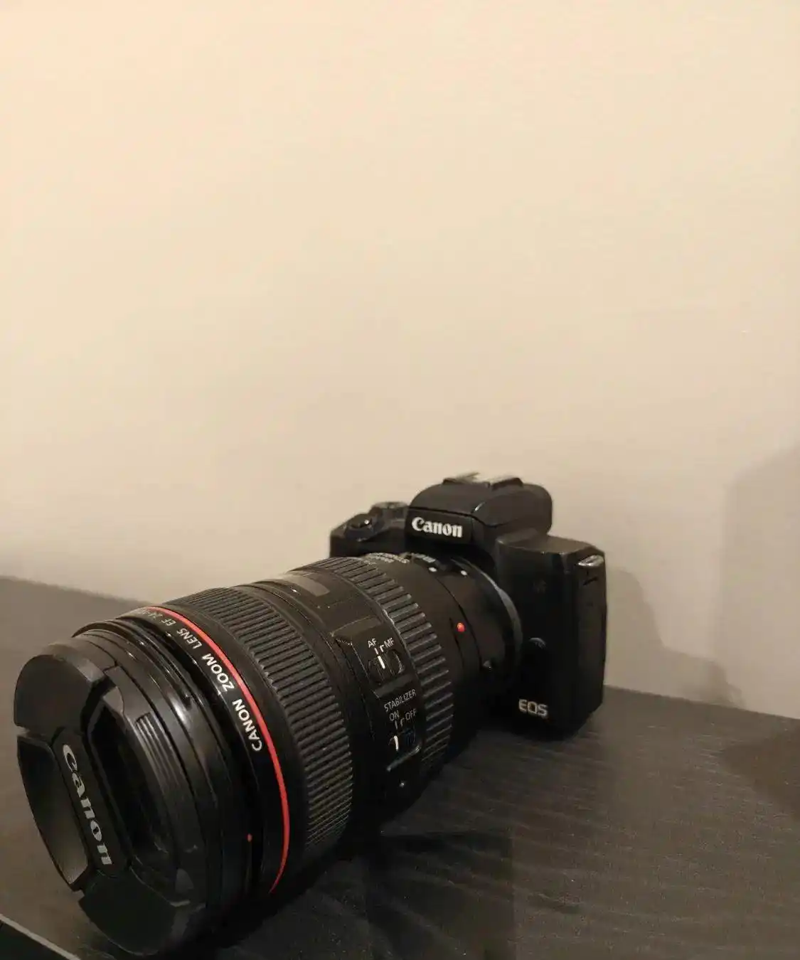 canon m50.  lens 24-105.   lens f1/8 دست دو