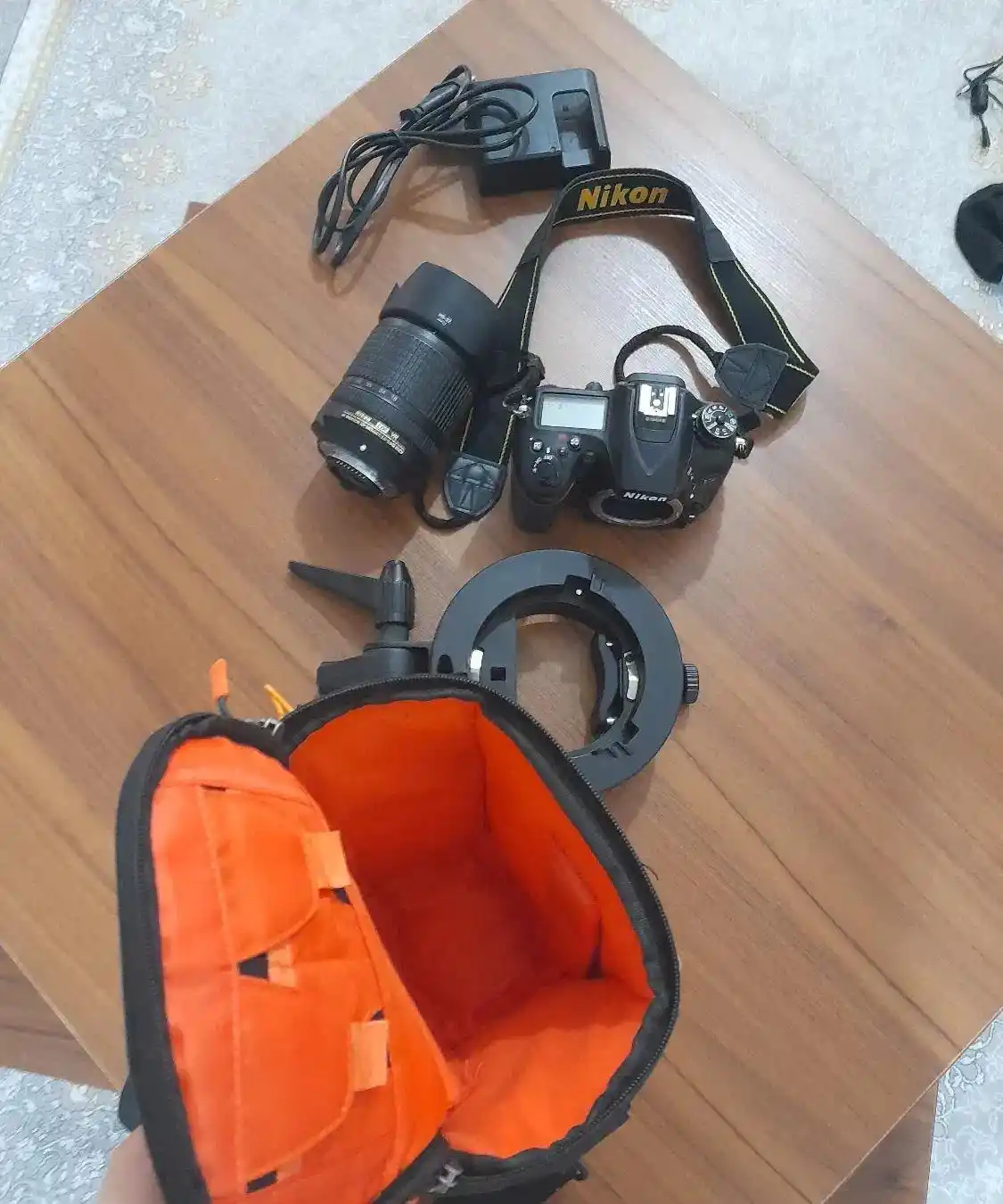 دوربین نیکون d7200 لنز ۱۸.۱۴۰باتری کیف شارژر هولدر دست دو