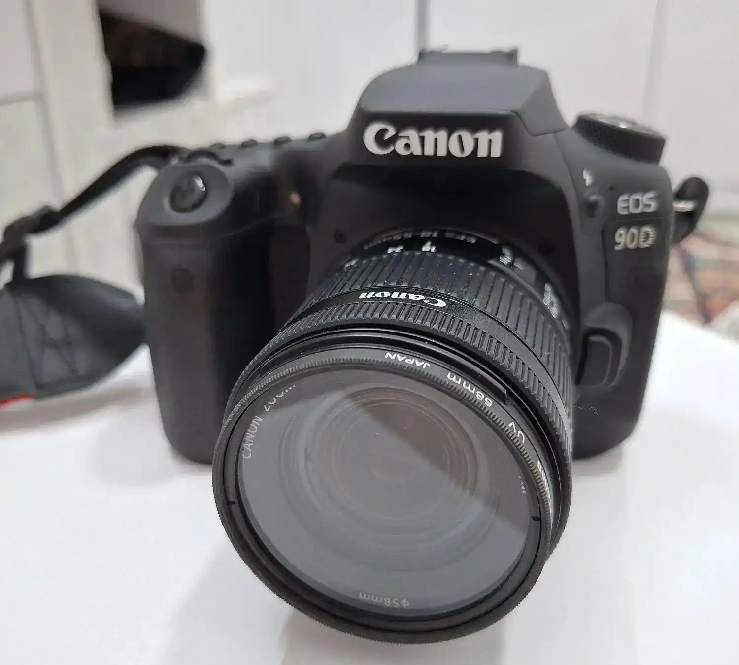 دوربین کنون 90dبا لنز۱۸-۵۵،رم۱۲۸،باطری زاپاس و. دست دو