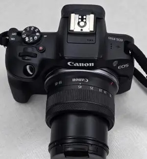 دوربین کنون r100بالنز۱۸.۴۵بفروش می‌رسد دست دوم