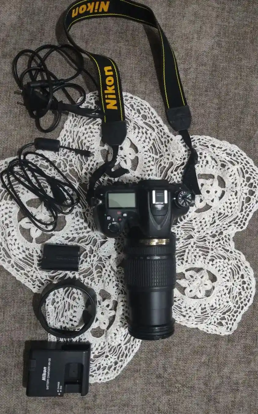 دوربین Nikon D7100 کم کار کرد+لنز 18-140 در حد نو دست دو