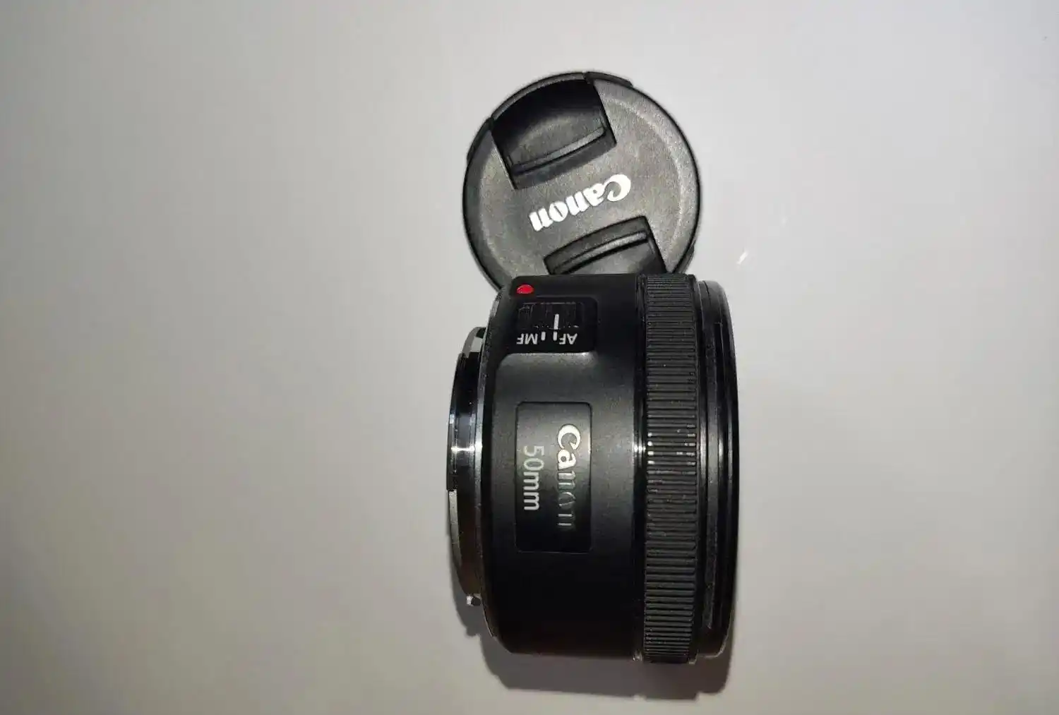 لنز کانن 50mm fix f 1.8 دست دو