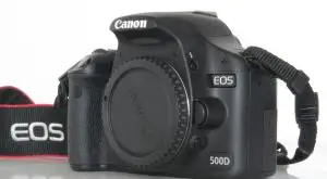 فروش دوربین Canon EOS 500D + لنز Canon 18-200mm دست دوم