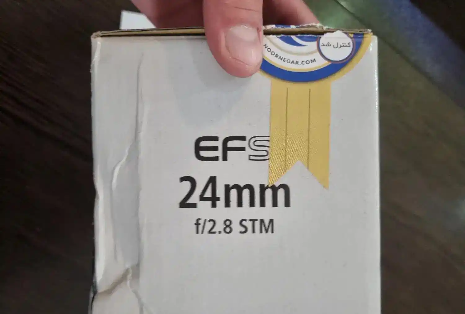 لنز کانن EF-S 24mm f2.8 STM کاملاً نو دست دو