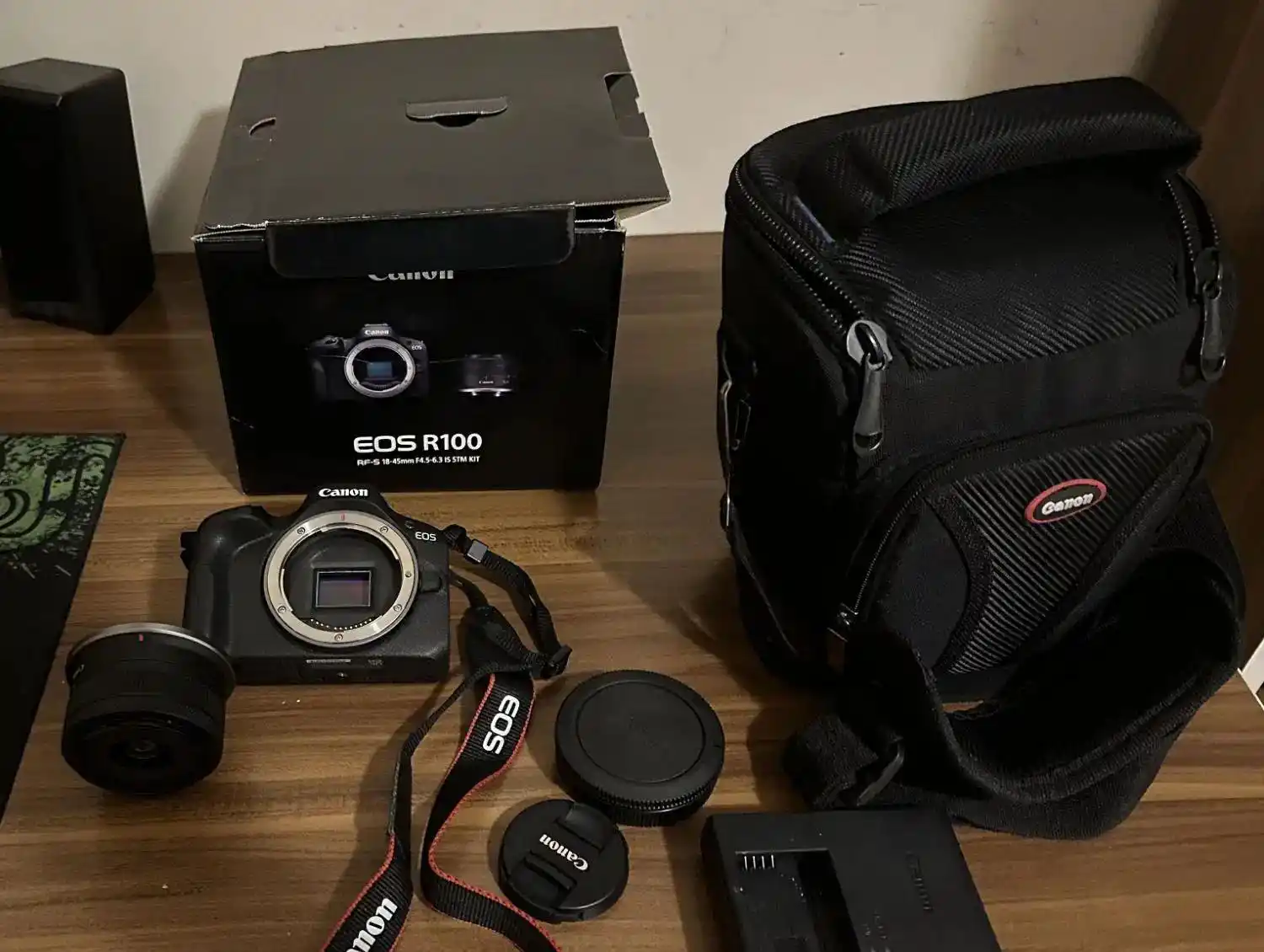 دوربین کنون (لنز EOS R100 (18-45 دست دو