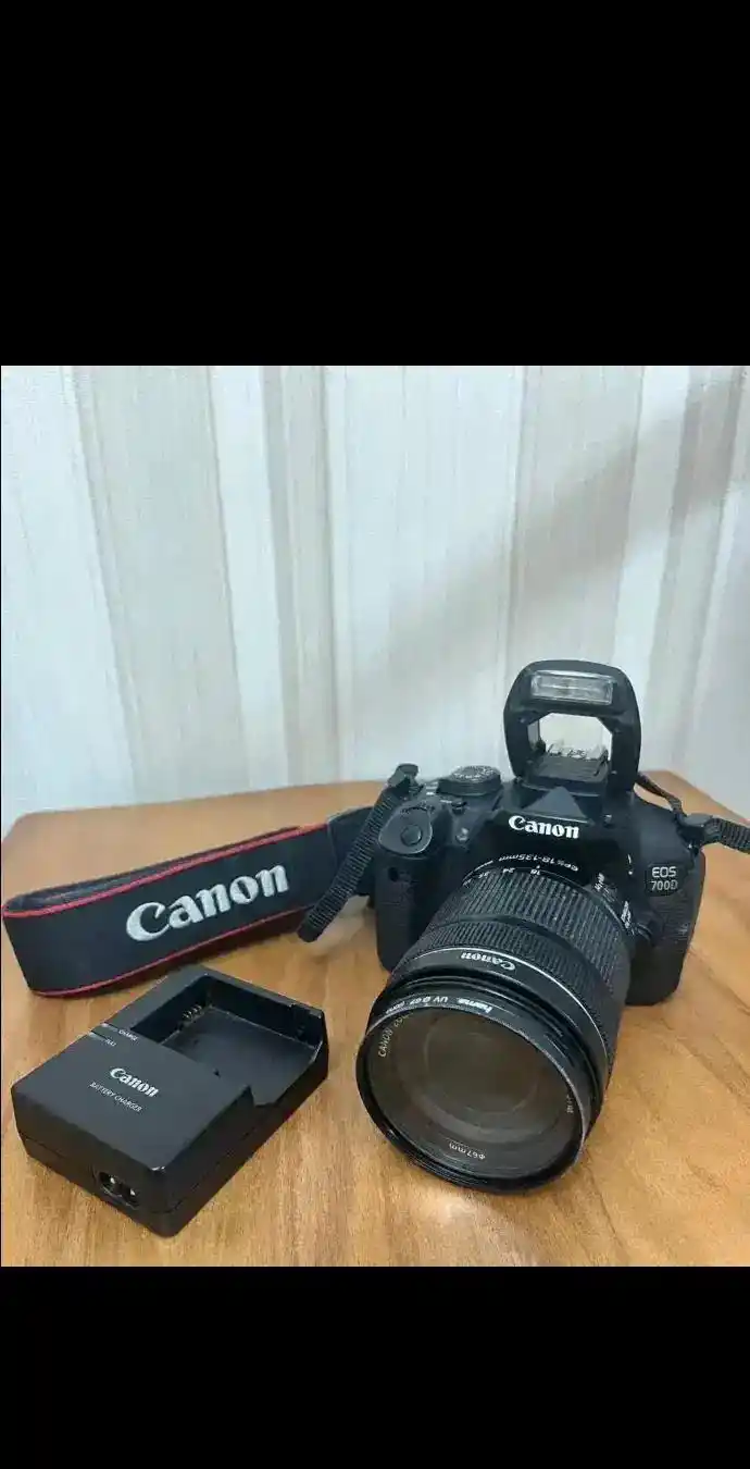 دوربین عکاسی کنون ۷۰۰D با لنز ۱۳۵-۱۸+کیف دست دو