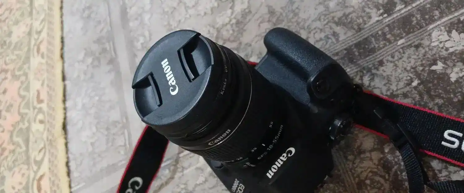 دوربین عکاسی کانن EOS 2000D لنز ۱۸-۵۵ میلی متر ۲۴ دست دو