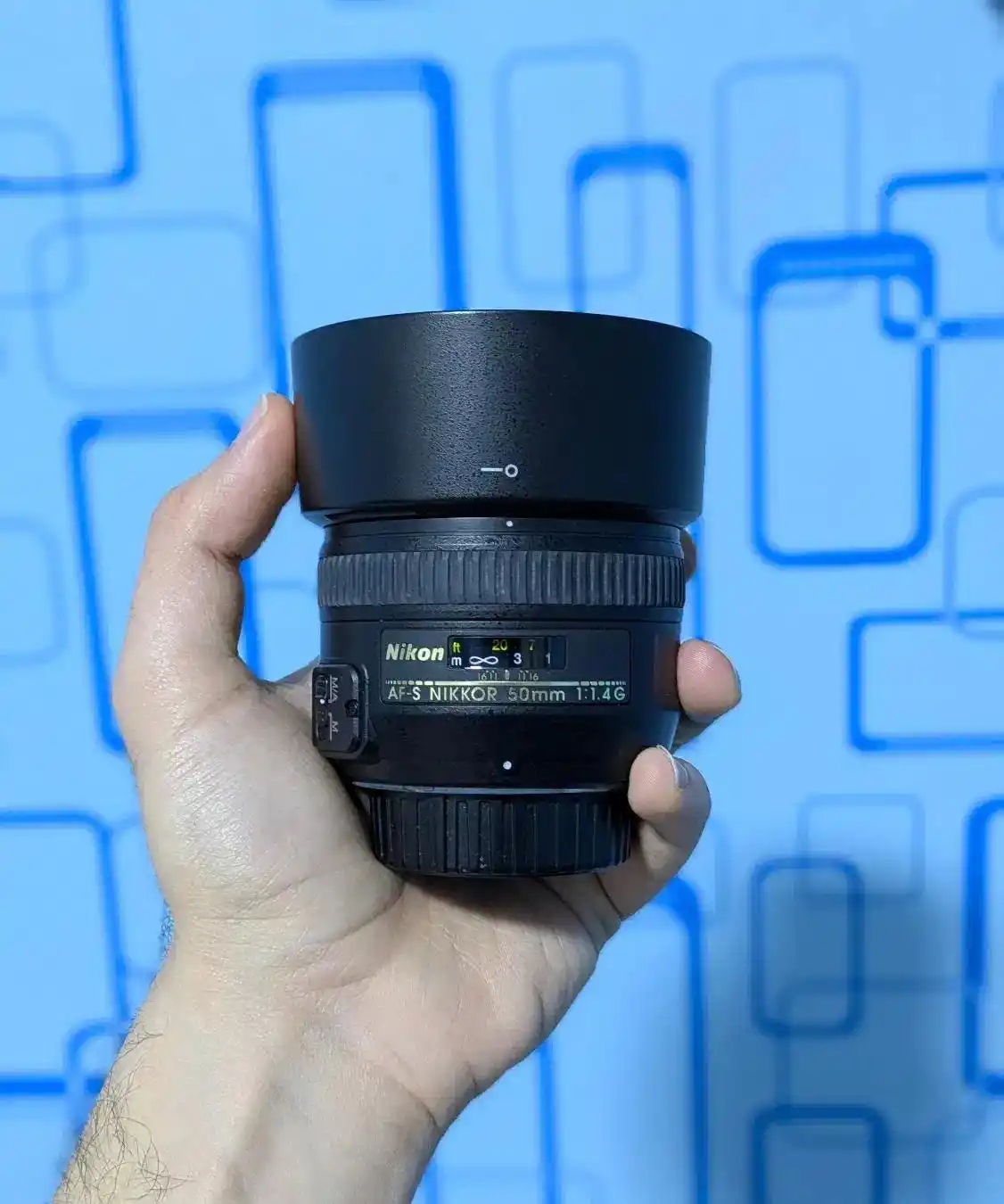 لنز نیکون 50mm f/1.4 G دست دو