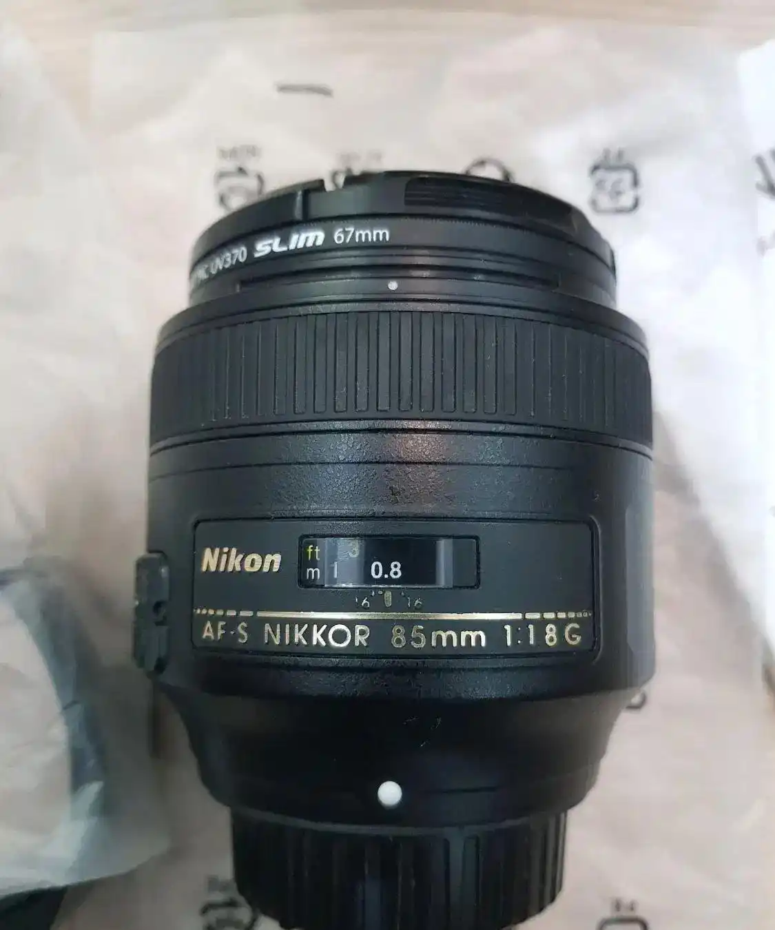 لنز نیکون ۸۵ میلی متر nikon af-s Nikkor 85mm/1.8G دست دو