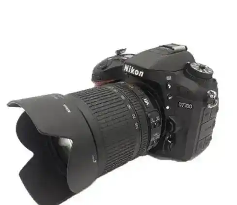دوربین نیکون ۷۱۰۰D لنز 18.140 دست دو