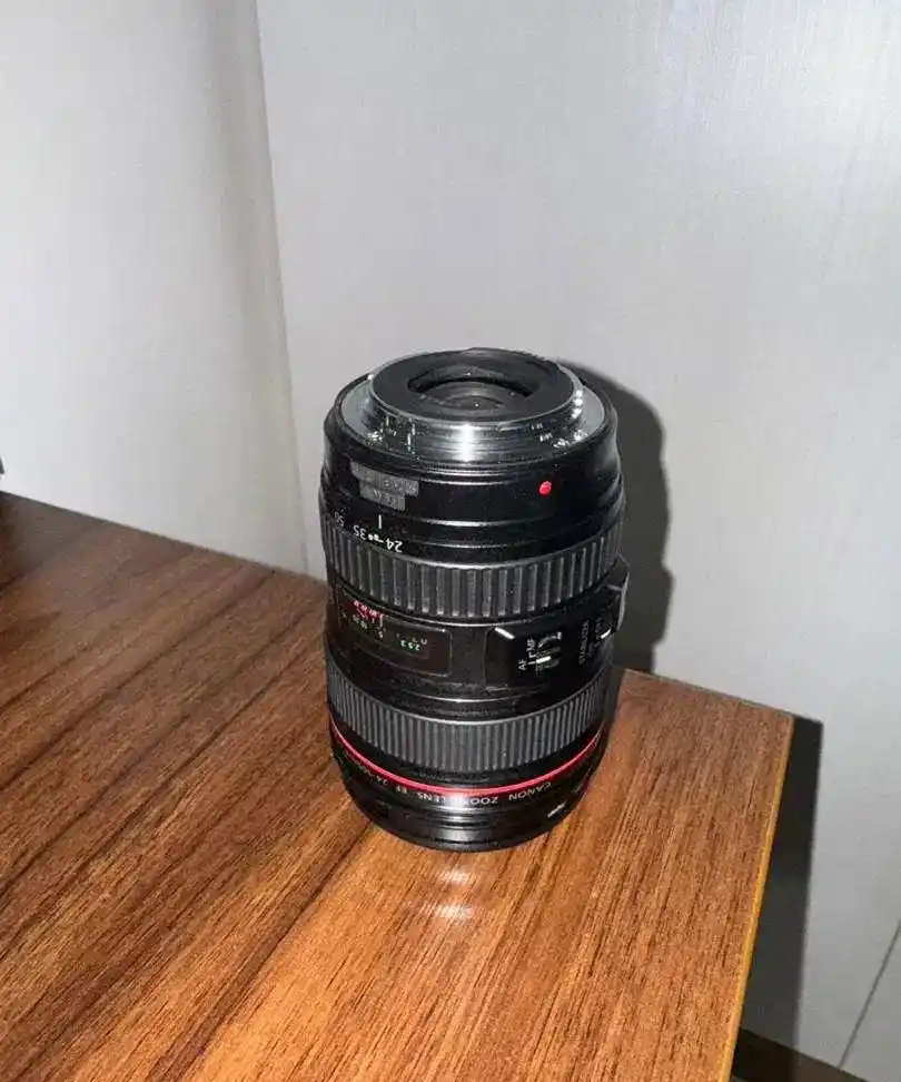 دوربین 2000D کانن بهمراه لنز 24-105 با کیف ضد ضربه دست دو