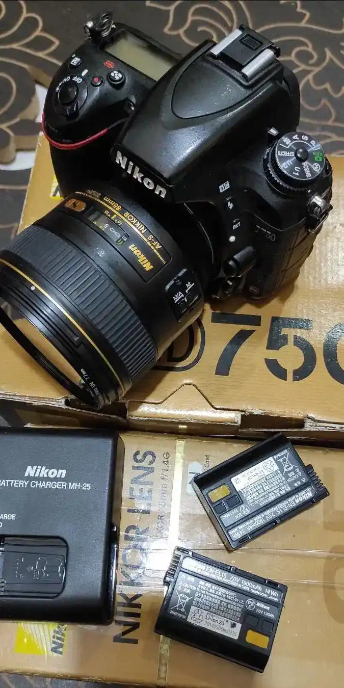 دوربین نیکون d750 لنز نیکون 85 f1.4 نانو دست دو