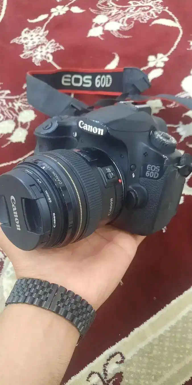دوربین عکاسی کانن 60d با گارانتی دست دو