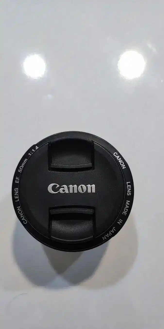 لنز 50mm f1.4 کانن دست دو