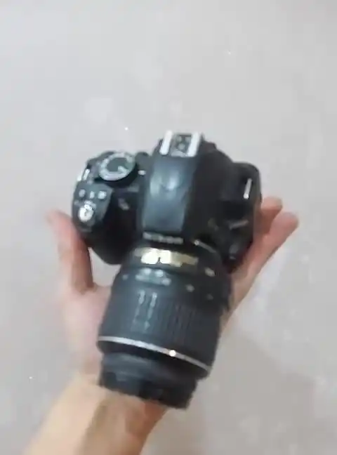 دوربین نیکون3100dولنز۱۸-55 vr لرزشگیردار دست دو