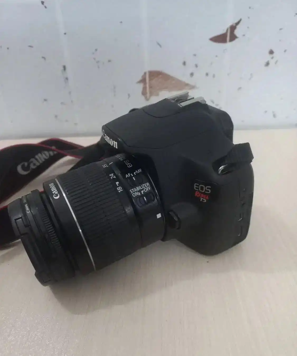 دوربین کانن۱۲۰۰d REBEL T5 دست دو