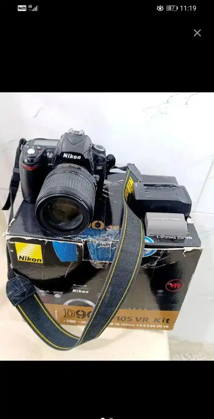 دوربین عکاسی حرفه ای نیکون D90 بالنز۱۸/۱۴۰ دست دو