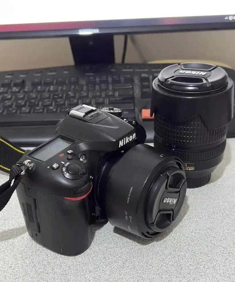نیکون d7100 با دو عدد لنز و سالم دست دو