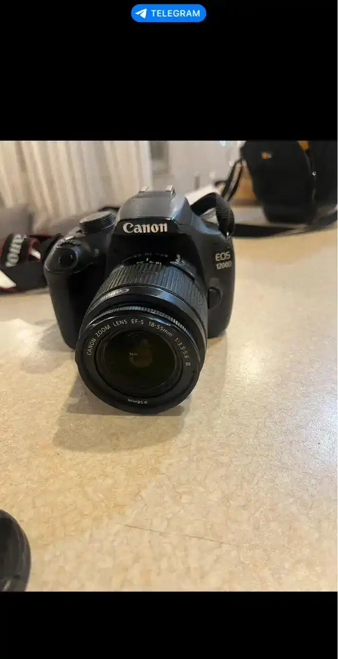 دوربین کنون۱۲۰۰ دست دو