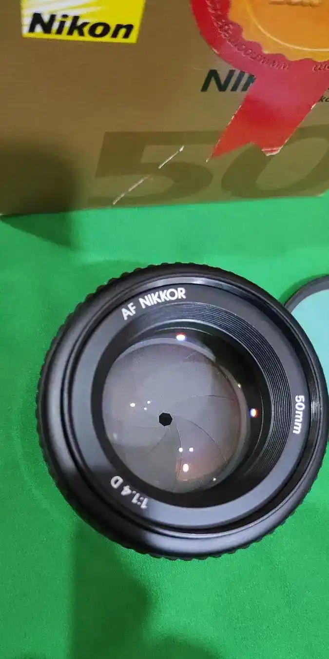 لنز نیکون 50 f1.4d دست دو