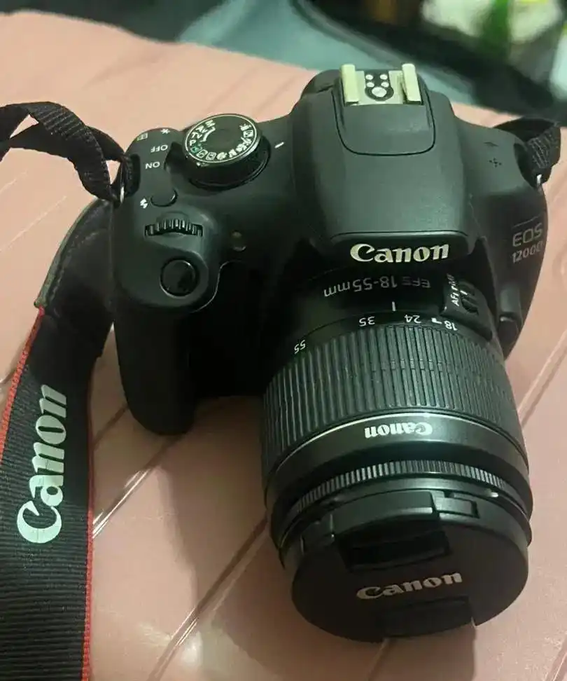 دوربین عکاسی کنون 1200 d دست دو