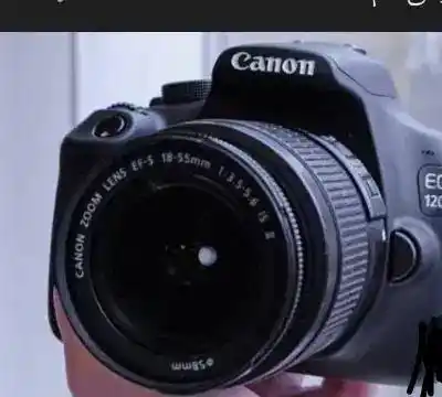 دوربین عکسبرداری و فیلمبرداری کنون1200D دست دو