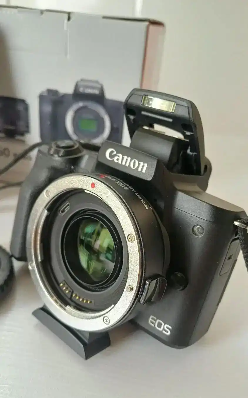 دوربین  Canon m50 + ( Auto Focus Mount Adapter ) دست دو