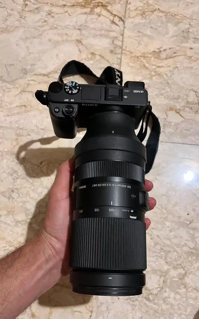 دوربین بدون آیینه سونی A6400 با لنز 100 - 400سیگما دست دو