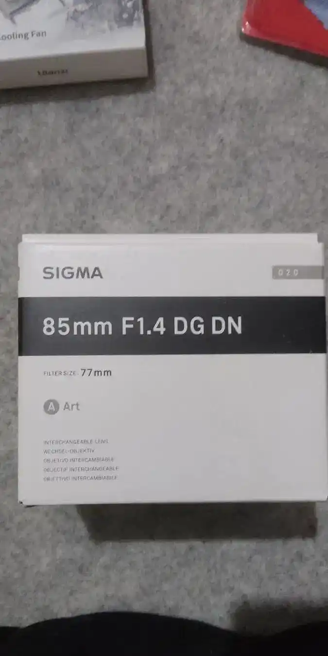 لنز 85mm  سیگما ،فن خنک کننده دوربین و ... دست دو