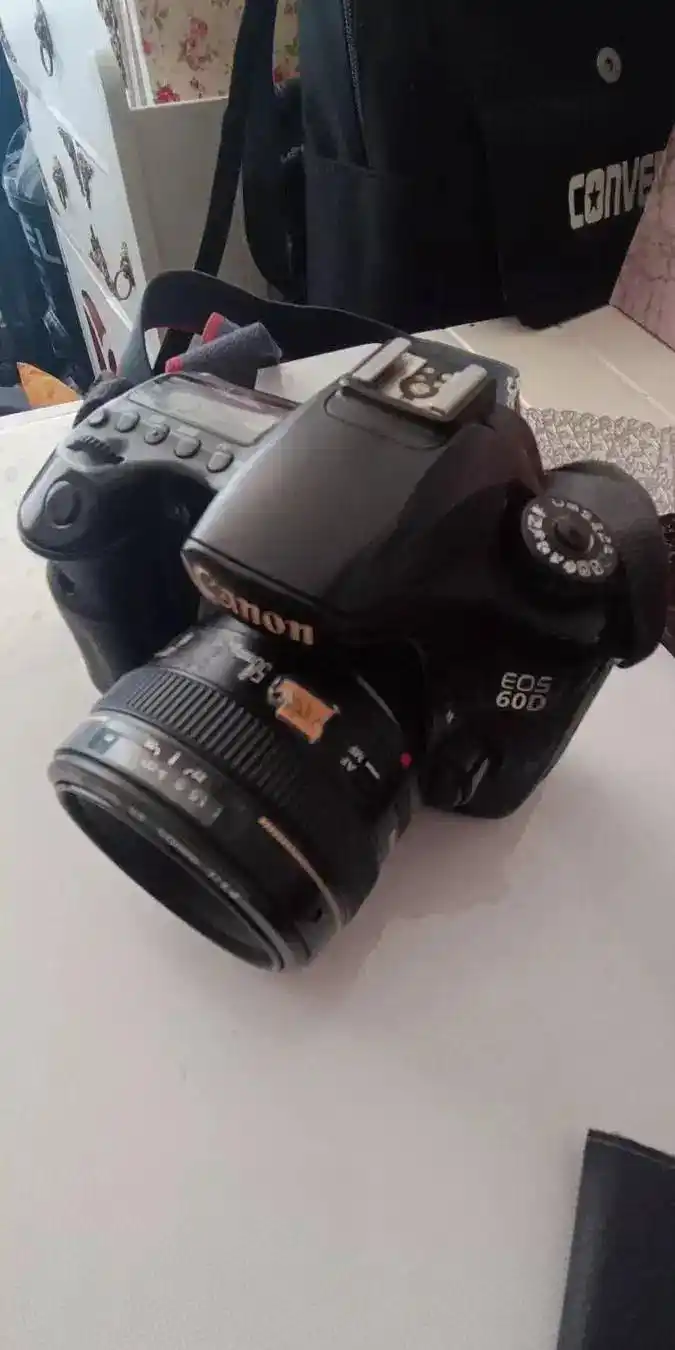 دوربین 60d کنون با لنز حرفه ای 50.f1.4 دست دو
