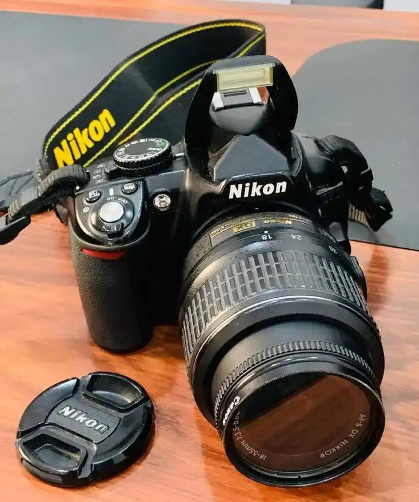 دوربین حرفه ای نیکون Nikon D3100 دست دو