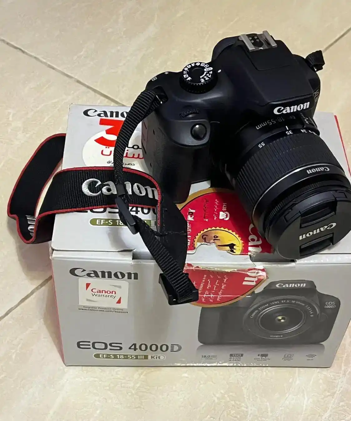 دوربین دیجیتال کانن مدل EOS 4000D دست دو