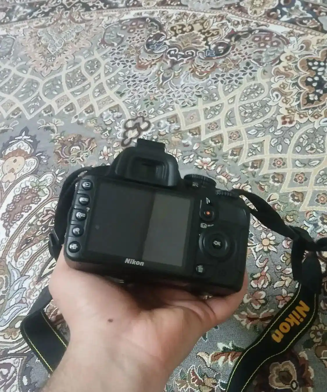 دوربین عکاسی Nikon  مدل D3100 دست دو