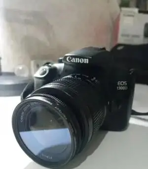 دوربین عکاسی کنون همراه با لنز canon eos 1300d دست دوم