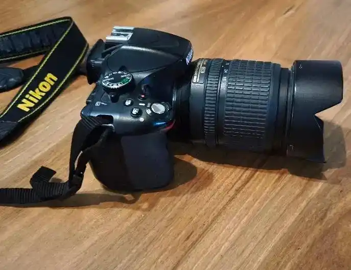 دوربین نیکونD5100 + لنز بی‌نظیر نیکون 105-18 Nikon دست دو