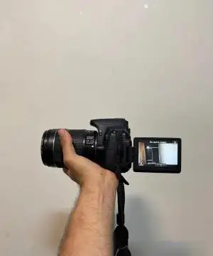 دوربین عکاسی canon 700d 18-135 mm بالنز 50mm f 1.8 دست دوم