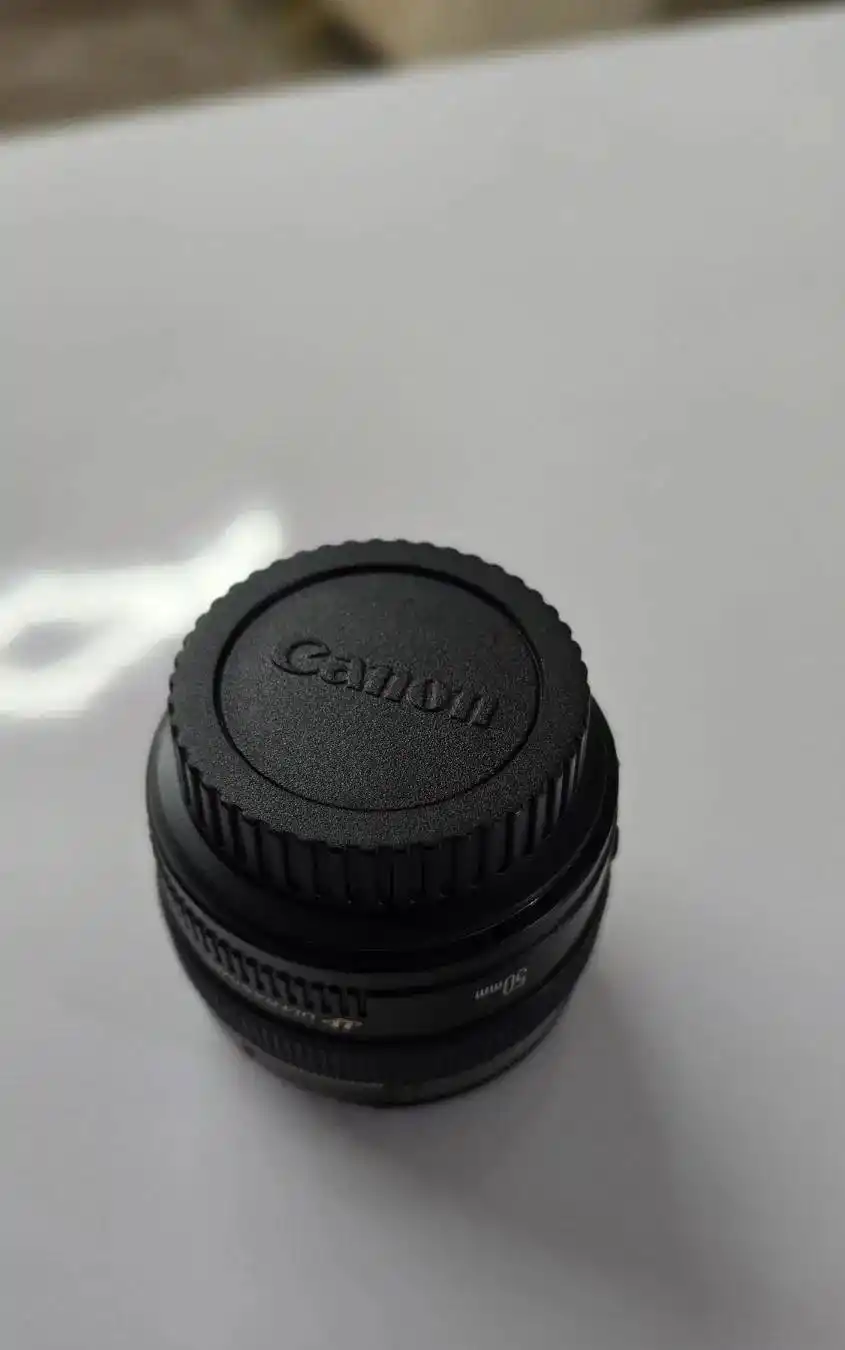 لنز کنون 50mm f1.4 دست دو