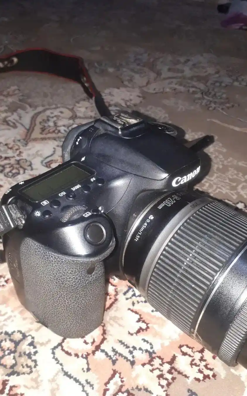 دوربین 70d عکاسی و فیلم‌برداری با لنز 18-200 دست دو