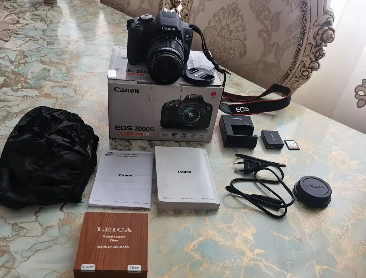 دوربین عکاسی کنون CANON EOS 2000D با وسایل جانبی دست دو