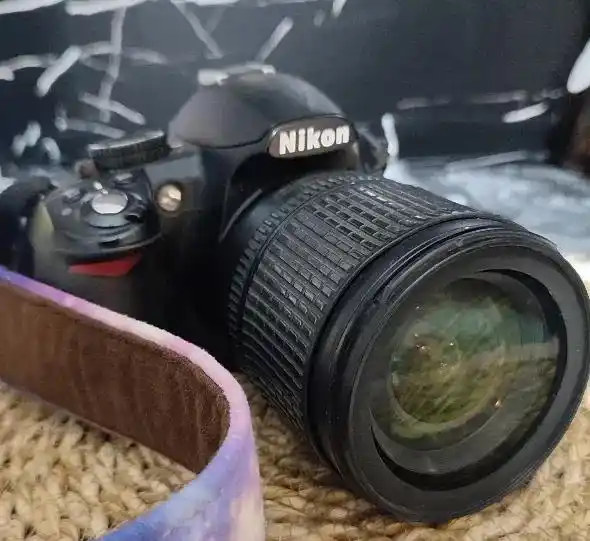 دوربین عکاسی نیکون D3100 دست دو