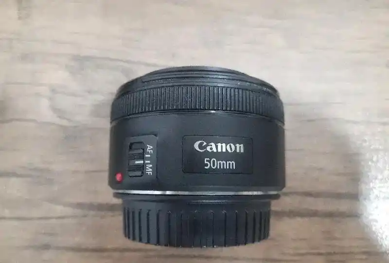 لنز کنون 50mm f1.8 دست دو