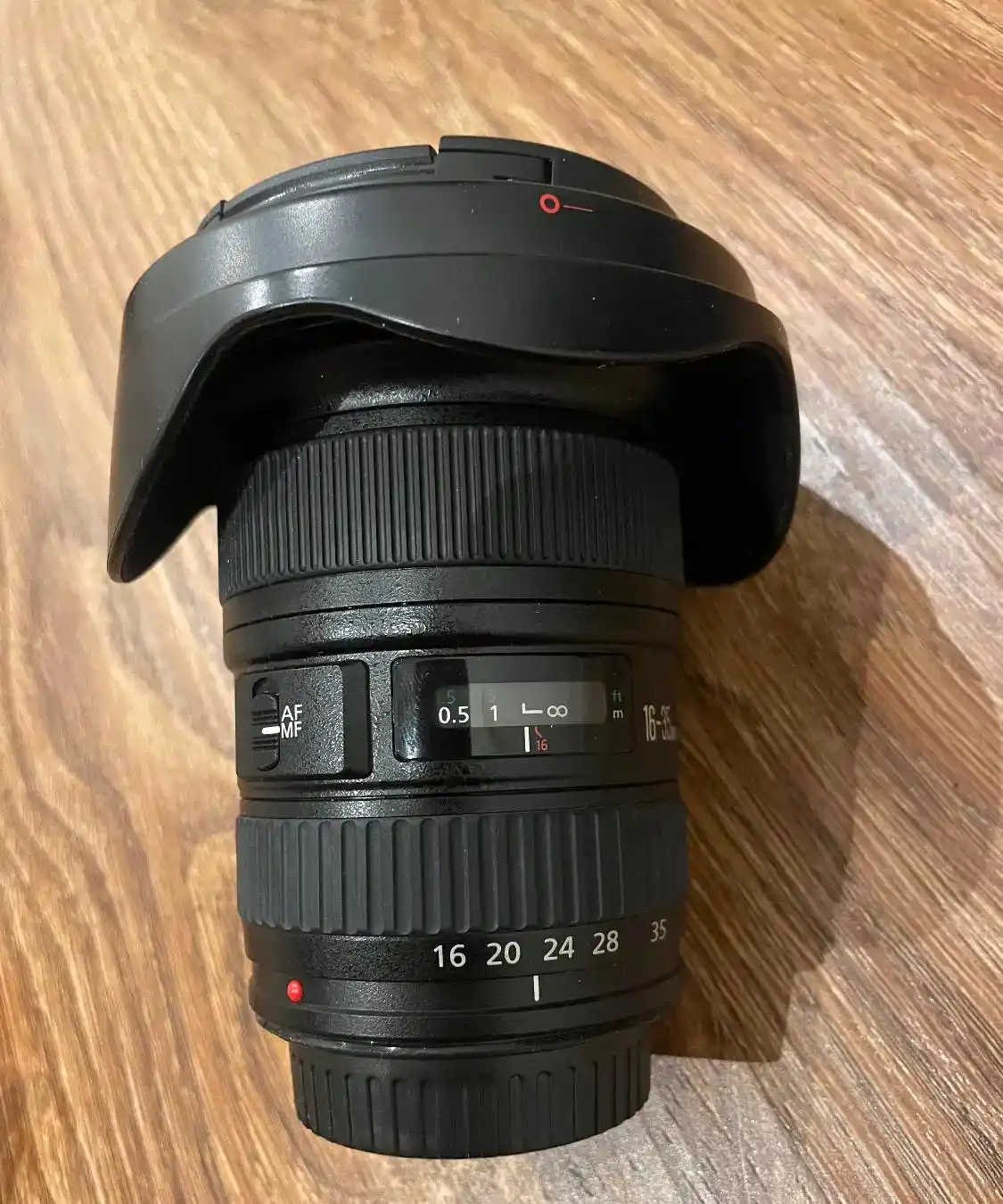 لنز دوربین کنون16-35 f2.8 کاملا نو دست دو