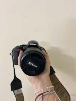 دوربین نیکون D5600 + 18-140mm VR بدنه دست دوم