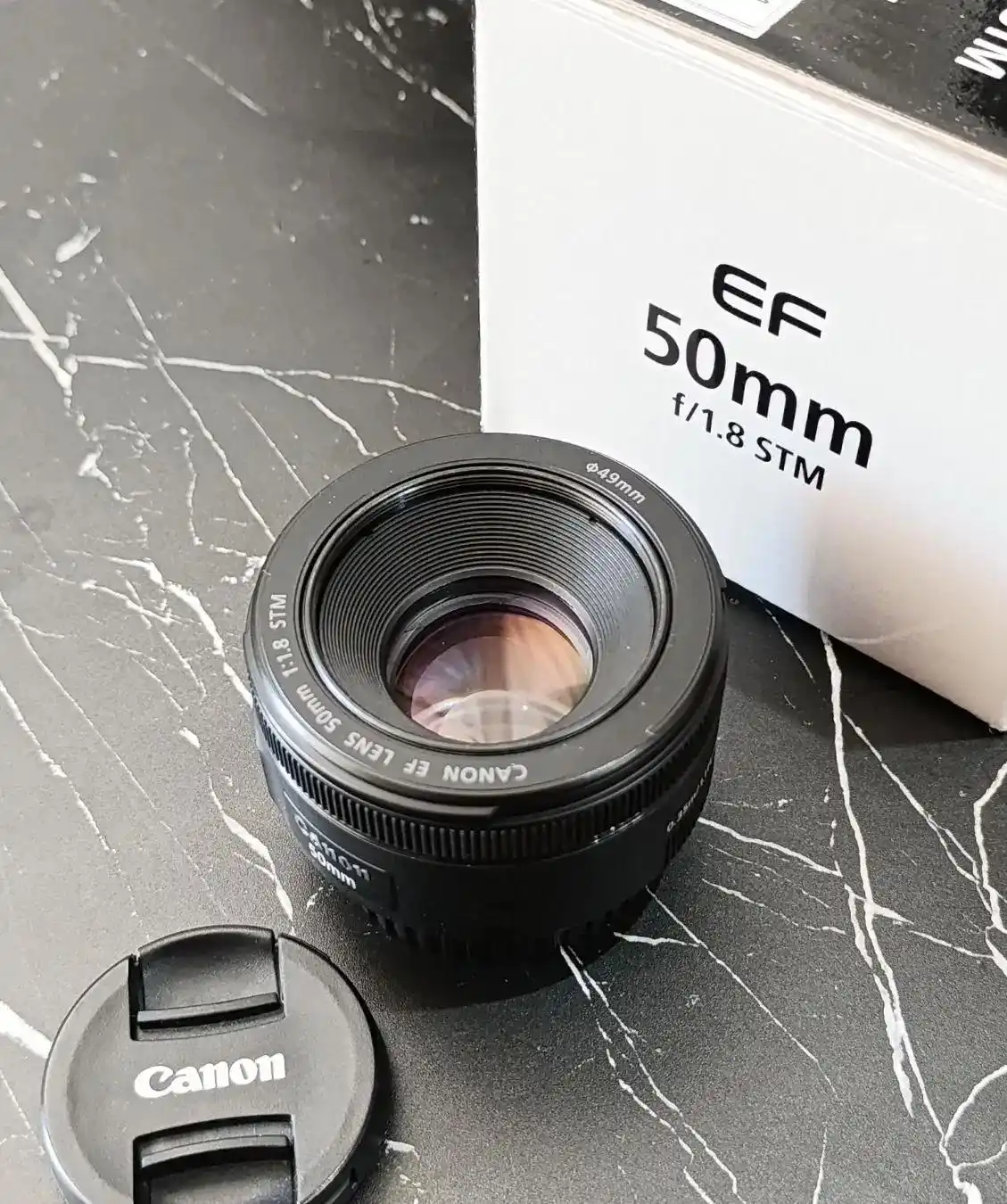 لنز Canon EF 50mm f/1.8 STM + هود دست دو